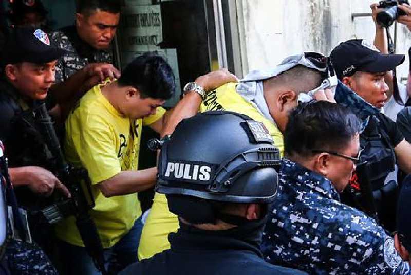 Three police officers sentenced to 40 years in jail for murder