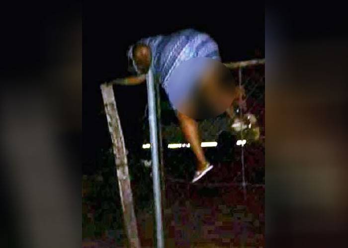 Viral picture of woman hanging precariously on fence not Omanga’s