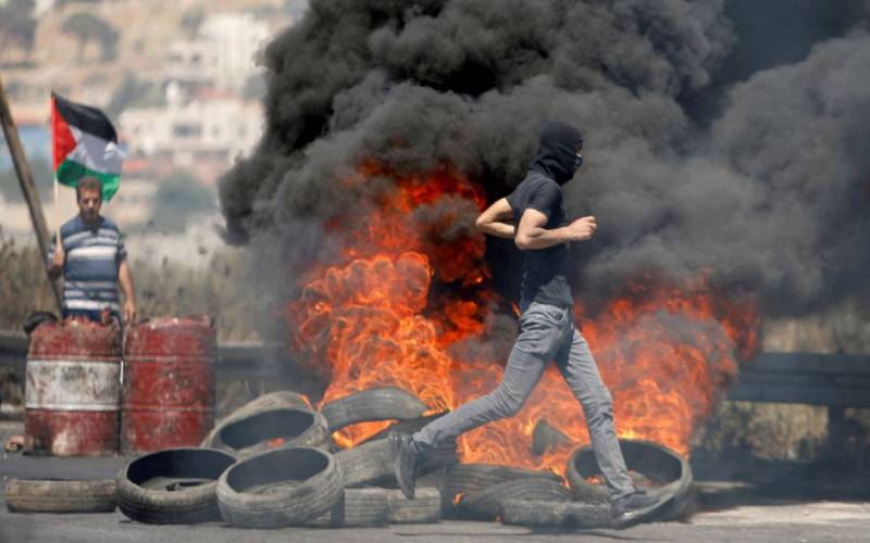 Amnesty accuses Israel of enforcing 'apartheid' on Palestinians