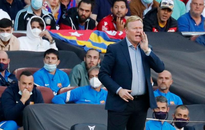 Barcelona condemn incident which saw fans surround car being driven by coach Koeman  