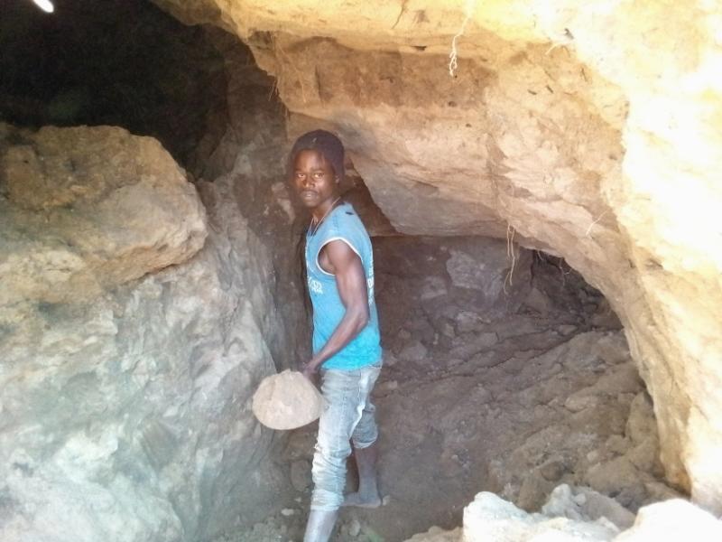 Hunger drives residents into deadly mining pits