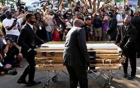 Thousands pay tribute to George Floyd as pressure mounts for U.S. police reform