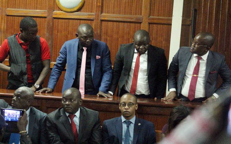 16 charged in gold probe