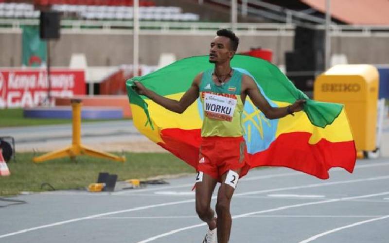 Ethiopia's Worku celebrates winning 3000m race