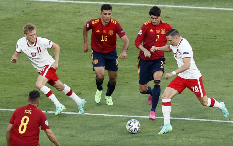 Poland's Piotr in action with Spain's Alvaro 