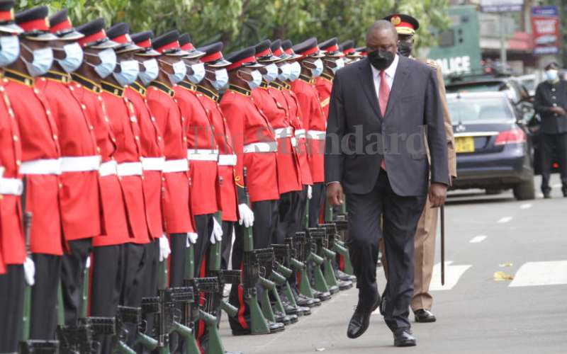 Pres. Kenyatta inspects guard of honor.