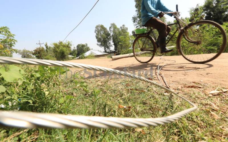 Live cables hang dangerously low along Chuowe