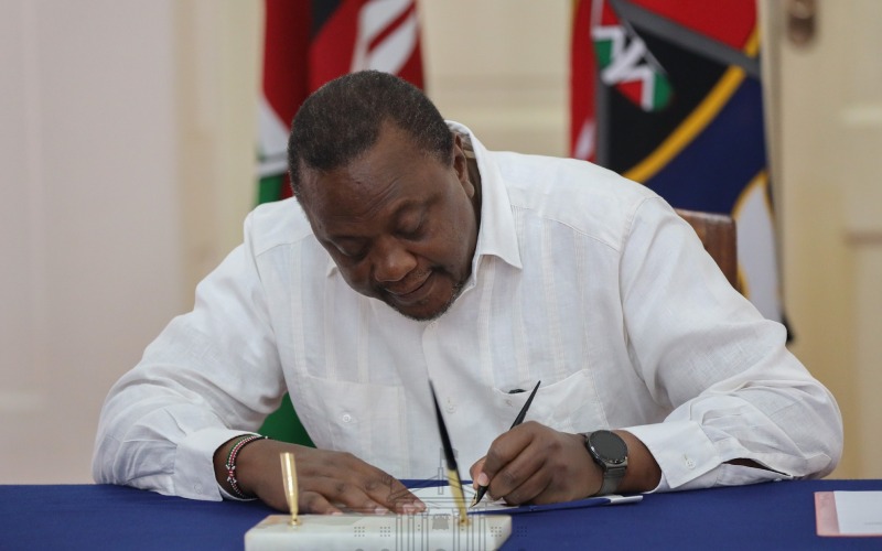 President Uhuru Kenyatta signs into law the 2021 Copyright (Amendment) Bill. [PSCU]