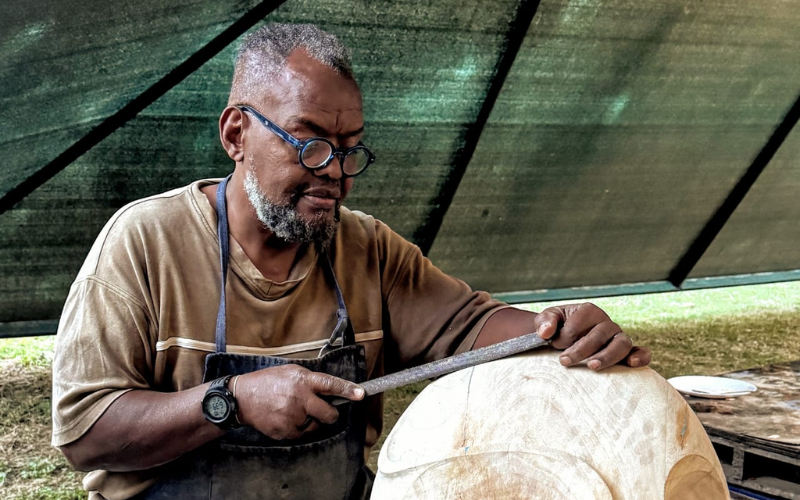 Sculptor Gakunju Kaigwa turns fallen trees into functional art in 'Ancestral Grain'