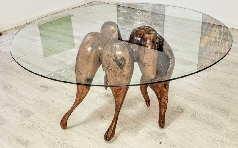 Sculptor Gakunju Kaigwa turns fallen trees into functional art in 'Ancestral Grain'