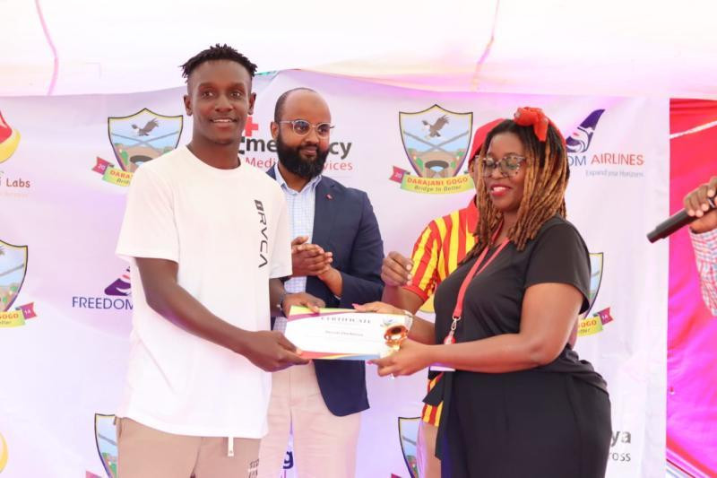 National Super League side Darajani Gogo FC's Veron Ombima is awarded by E-Ambulance Plus Brenda Kwena during the clubs' 10-year anniversary celebrations on February 26, 2025 in Nairobi. [Courtesy]