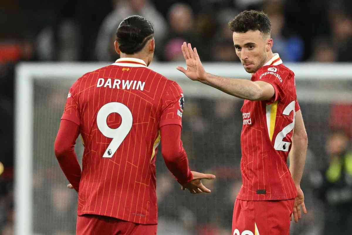 Liverpool's Portuguese striker #20 Diogo Jota (R) celebrates with Liverpool's Uruguayan striker #09 Darwin Nunez (L) after scoring their second goal during the English Premier League football match between Liverpool and Fulham at Anfield in Liverpool, north west England on December 14, 2024. (AFP Photo)