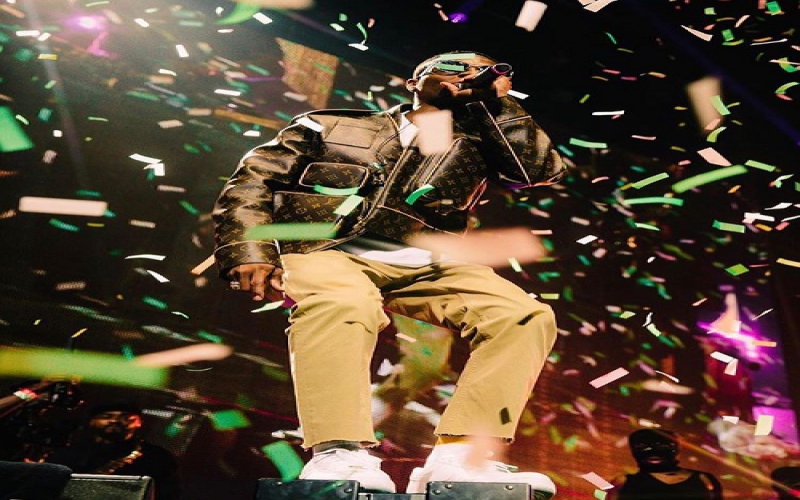 Closer Look At Wizkid's 2.3 Million Naira Louis Vuitton Jacket At Star Fest  in London