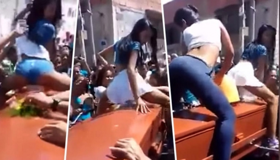 Two women TWERK over a coffin at a funeral | Daily Mail Online