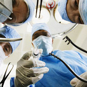 doctors performing surgery