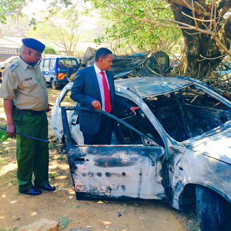 Governor Mutua with damaged car