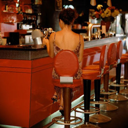 Woman at bar