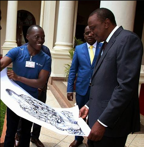 Jaduong present Uhuru with his potrait