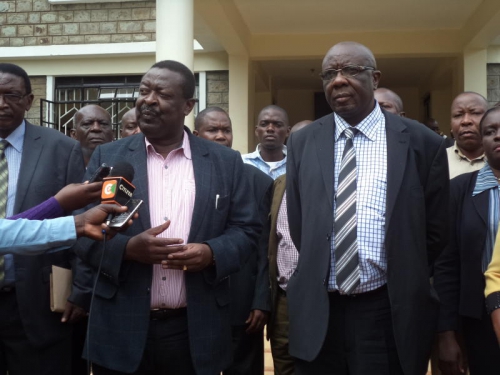 Former DPM Musalia Mudavadi, left, addresses the media after meeting Governor Moses Akaranga (r) in his office at Mbale.