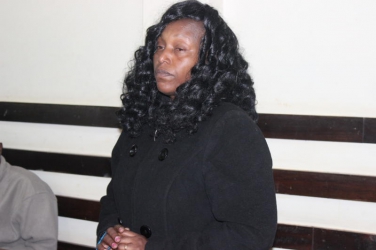 I did not hire my husband's killers, secondary school principal tells court