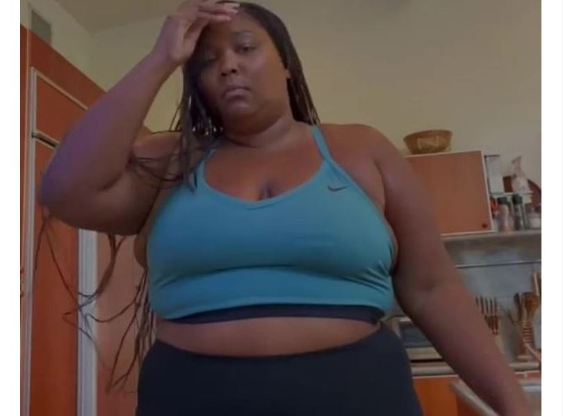 Lizzo bares midriff in crop top after defending weight loss