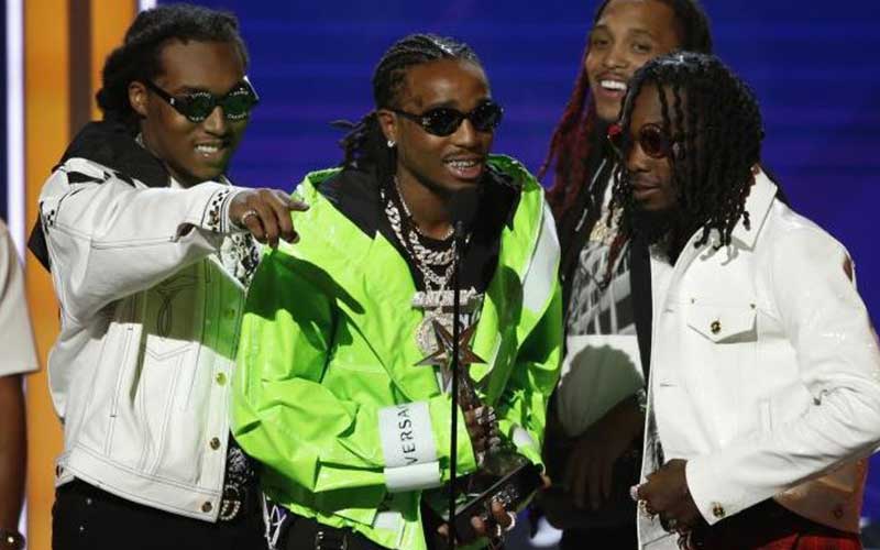 Migos accepts the award for Best Group Photo: Reut