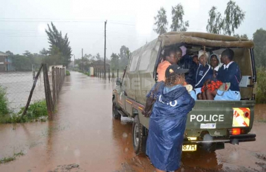 Students ferried to classrooms by police as floods wreak havoc